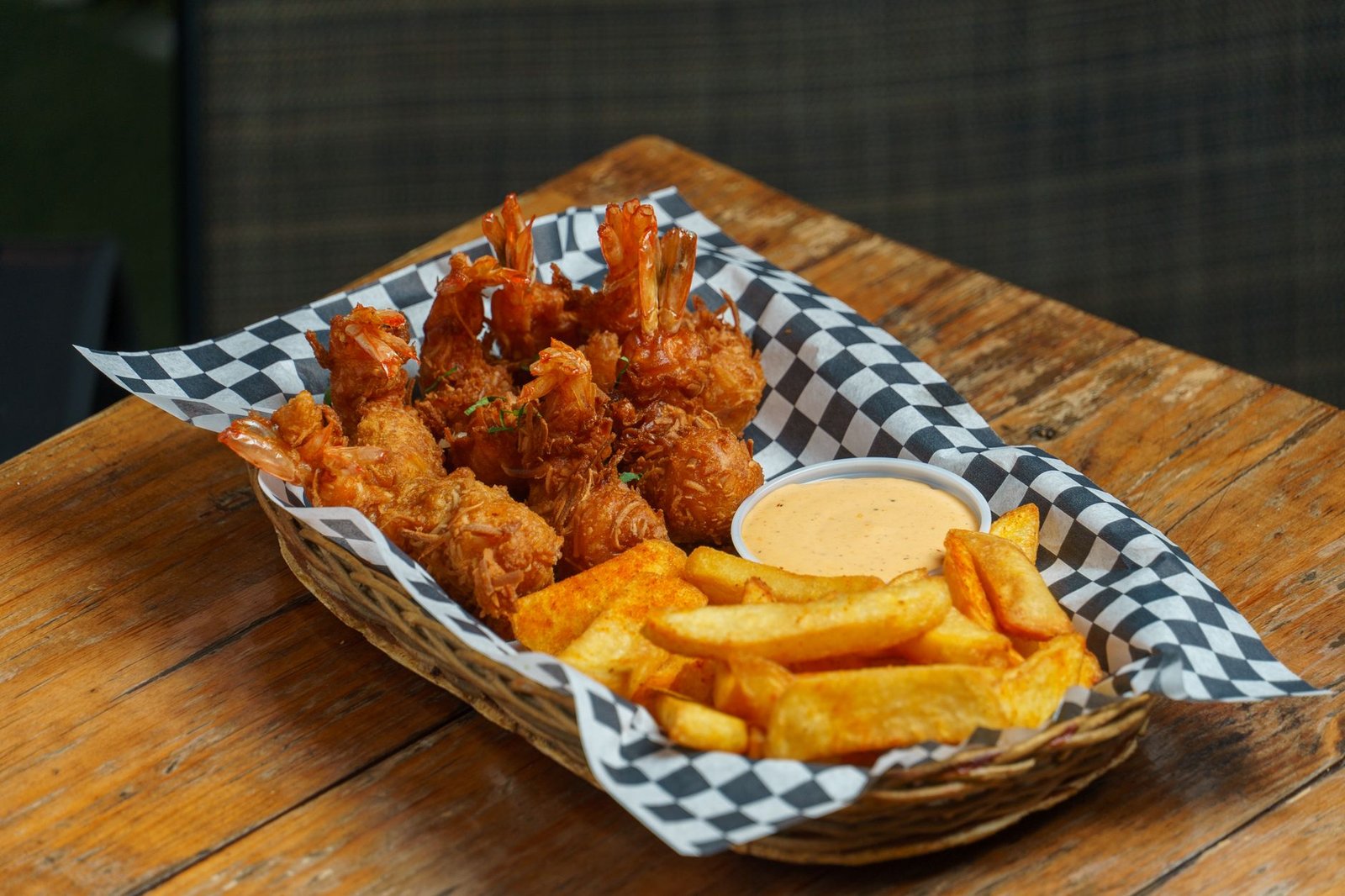 Crispy golden french fries fresh from an air fryer basket