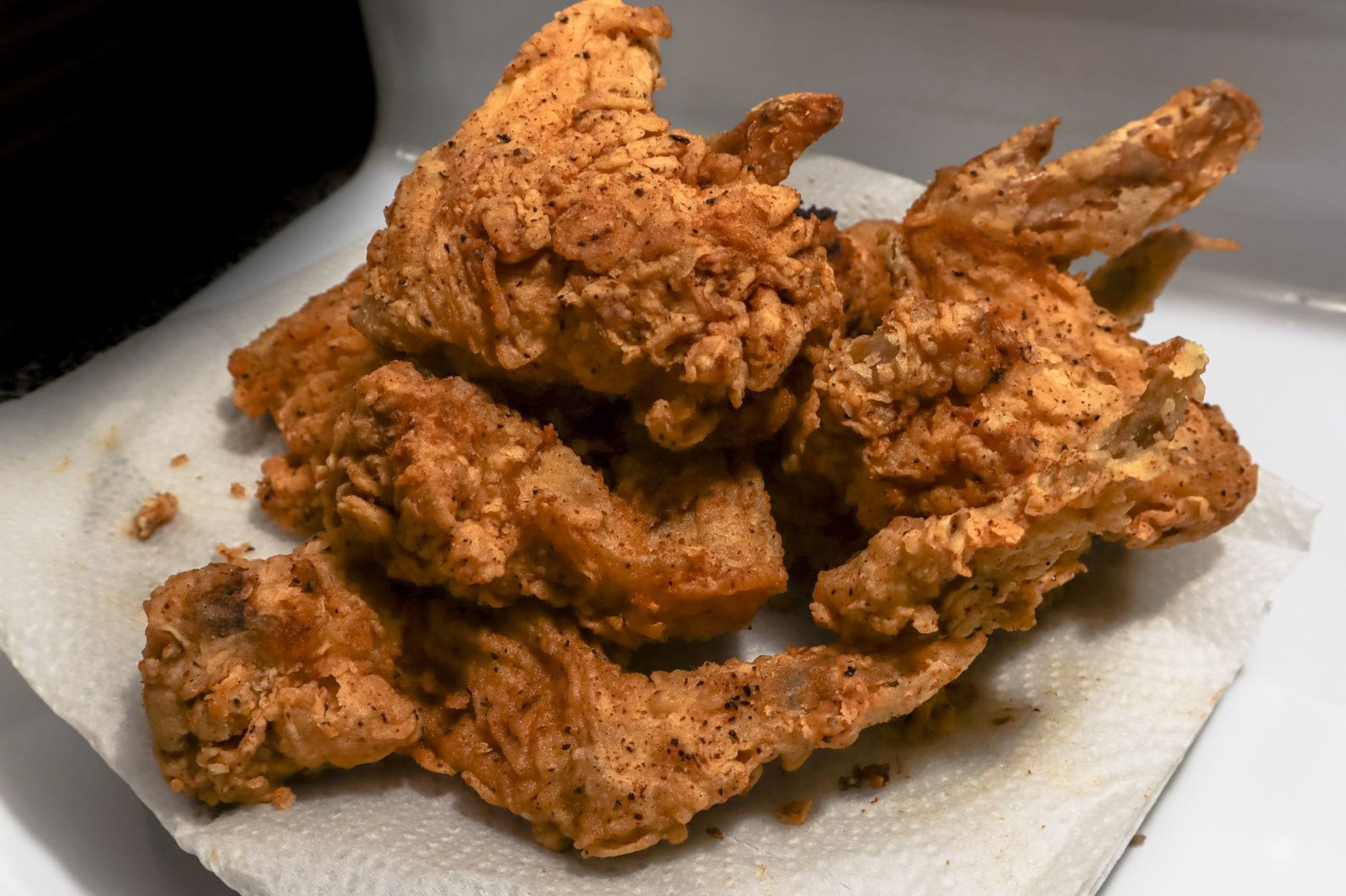 Golden crispy air-fried chicken pieces on a plate