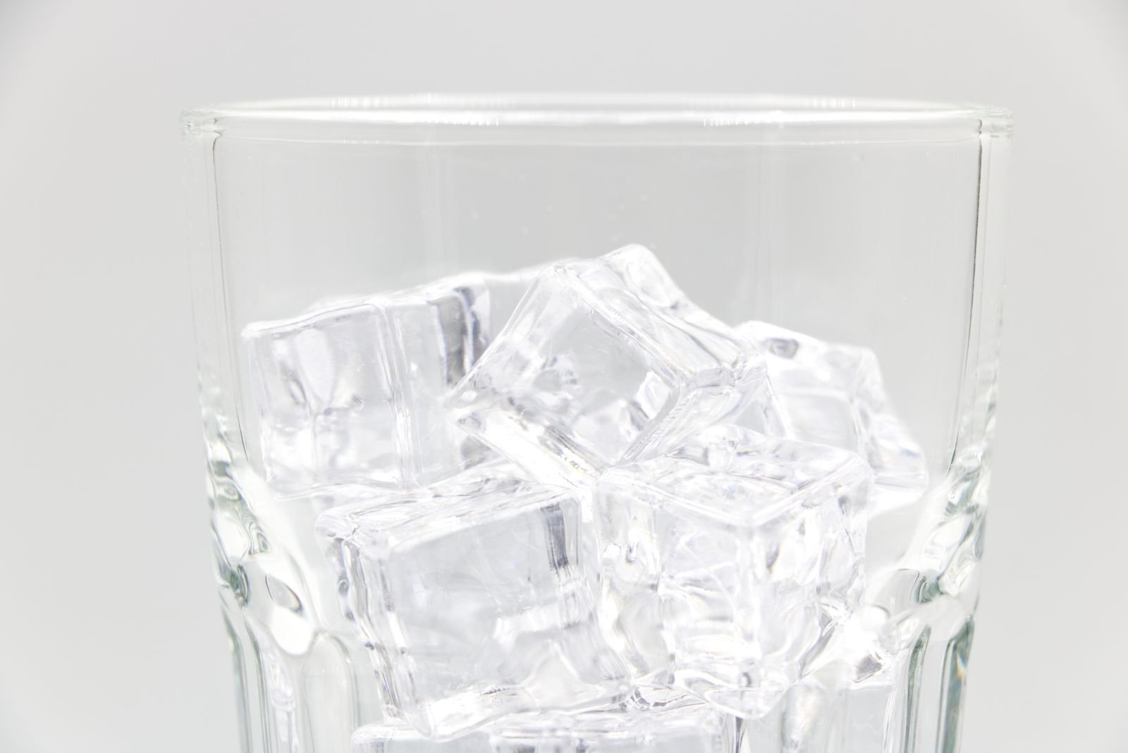 Countertop ice maker ice cubes in a glass, illustrating which machines keep ice frozen longer