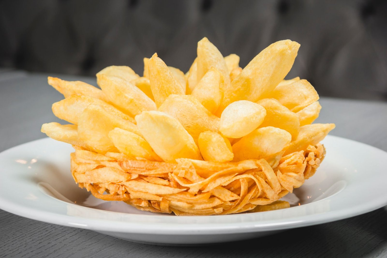 Golden crispy fries fresh out of an air fryer basket