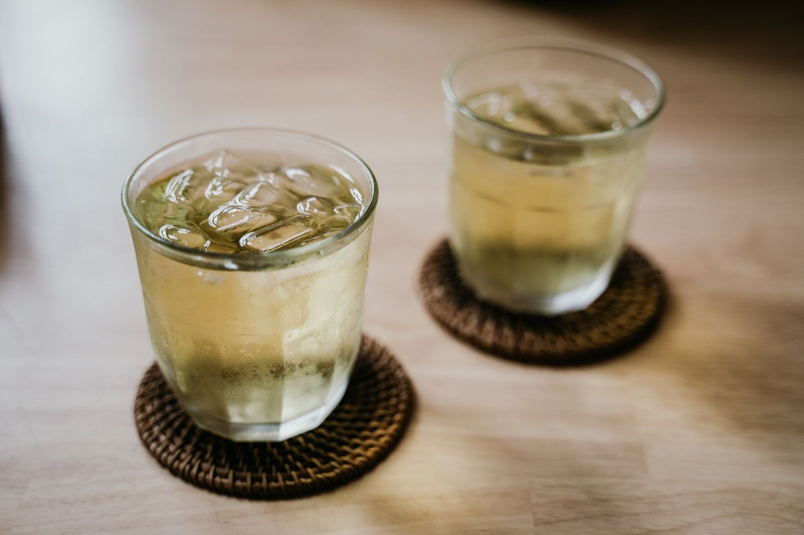 Glass filled with ice cubes representing daily output of a budget countertop ice maker