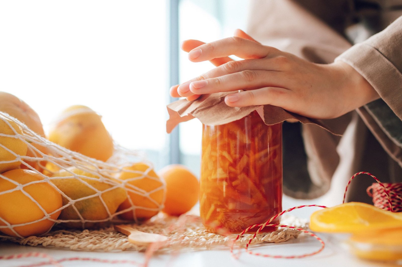 Glass jars with tight screw-top lids on a kitchen counter