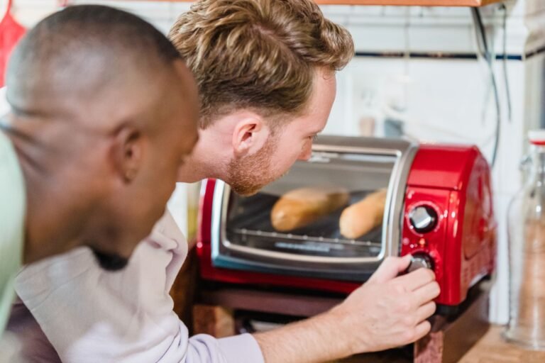 Bread baking inside a countertop toaster oven